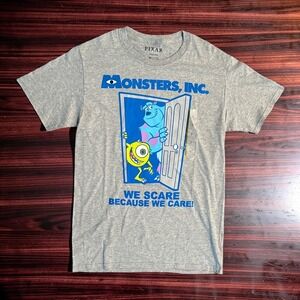 Disney Pixar Monsters Inc T-Shirt Mens Small Gray We Scare Because We Care NWOT